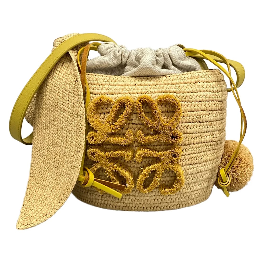 LOEWE BUNNY BUCKET NATURAL DARK YELLOW LEATHER: LOEWE Bunny Bucket Natural Dark yellow Leather Brand: LOEWE Type/Style: Shoulder Bag Material: Exterior Material Raffia, Leather Color: Exterior Color Natural (Beige), Dark yellow Size: Height : 8.27 