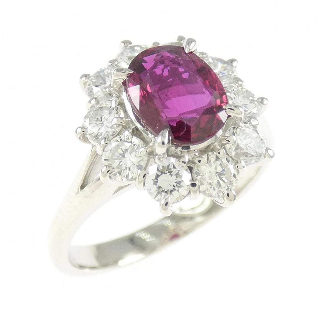 PT900 RUBY RING: PT900 Ruby Ring Brand: Unbranded Type/Style: Ruby ring Material: Platinum900, Main Stone Ruby Secondary Stone Diamond Color: Platinum Size: US 8.75 Accessories: None Accessories Notice: Wh