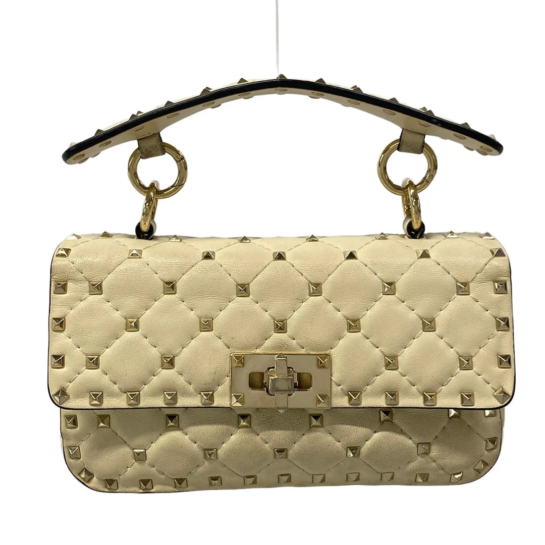 VALENTINOGARAVANI ROCKSTUD SPIKE LEATHER HANDBAG: VALENTINOGARAVANI Rockstud Spike Leather Handbag Brand: VALENTINOGARAVANI Type/Style: Handbag Material: Exterior Material Leather Color: Exterior Color Cream Size: Height : 4.33 inch (11 cm) Width : 7