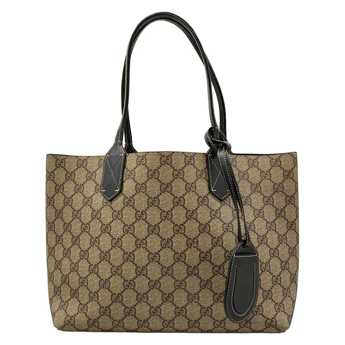 GUCCI SMALL GG LEATHER TOTE BLACK LEATHER TOTE BAG: GUCCI Small GG Leather Tote Black Leather Tote Bag Brand: GUCCI Type/Style: Tote Bag Material: Exterior Material PVC, Leather Color: Exterior Color Black, Beige, Dark Brown Size: Height : 8.07 inch (2