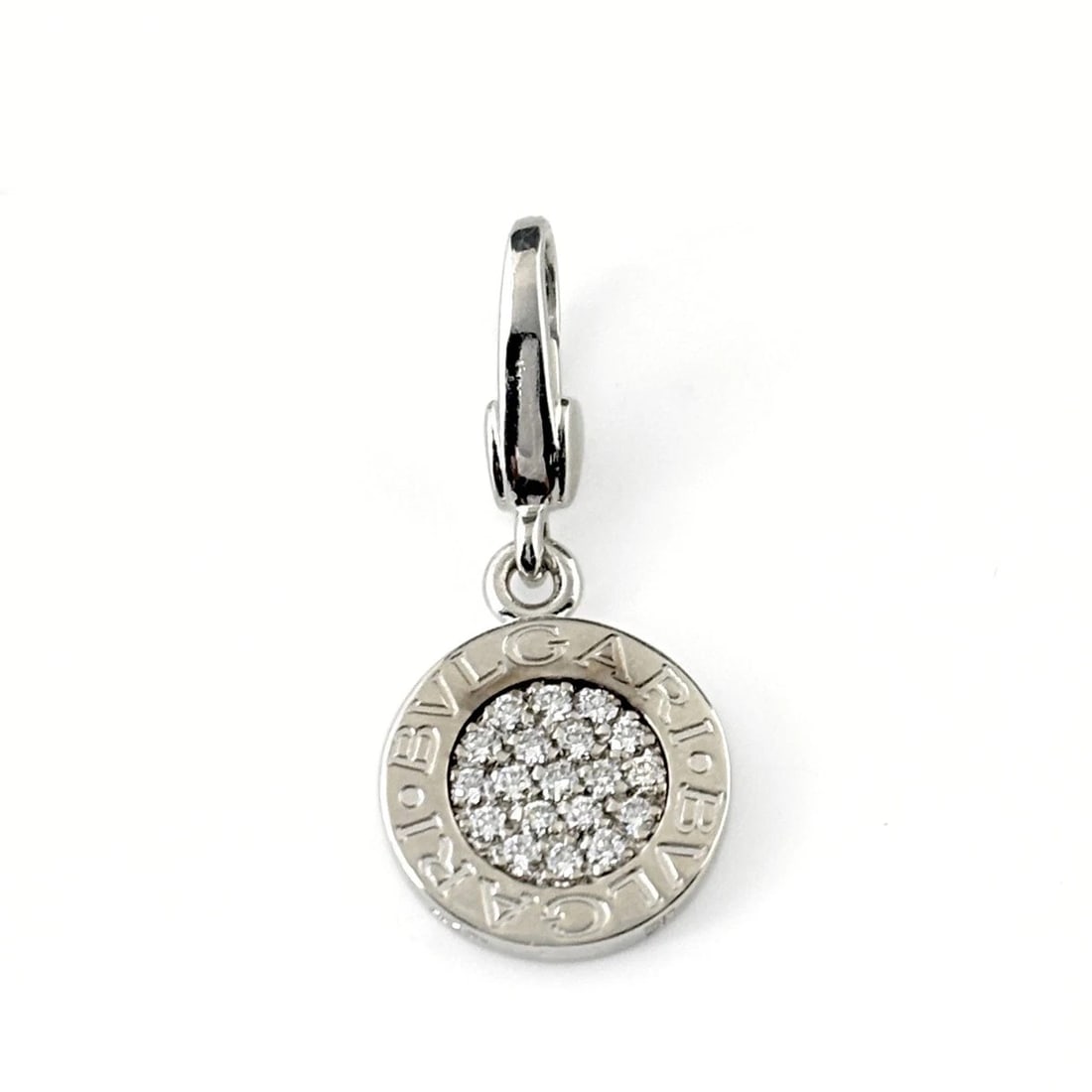 BVLGARI PENDANT HEAD MELEE DIAMOND .: BVLGARI Pendant Head melee diamond . Brand: BVLGARI Type/Style: Pendant Head Material: 750, Color: Silver Size: Total length of the pendant head including a bail 28.0?12.8mm(1.1") Inside diameter of