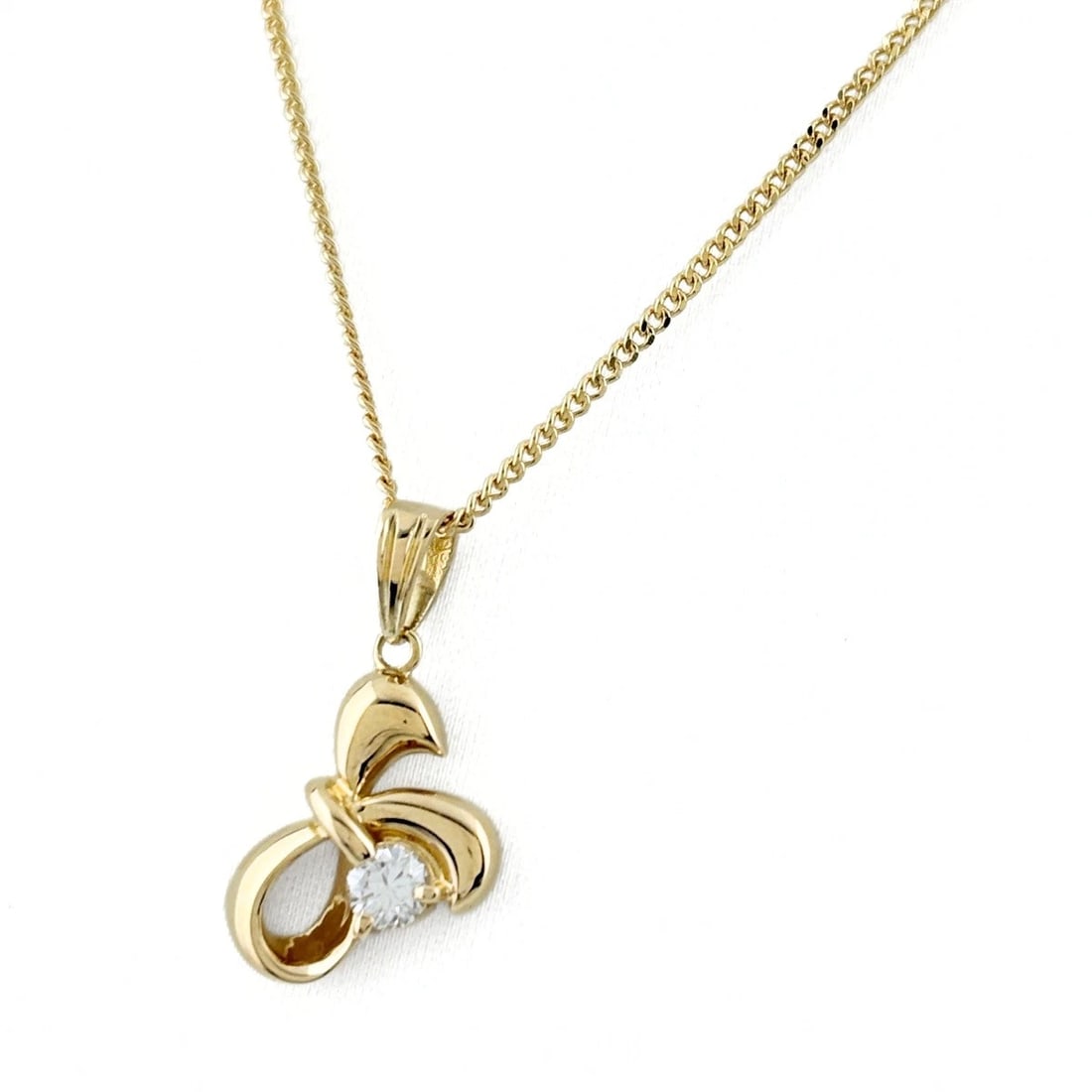 DIAMOND DESIGN NECKLACE YG YELLOWGOLD: Diamond design necklace YG YellowGold Brand: Unbranded Type/Style: Necklace Material: 18K YG, Color: YG Size: Chain / code 42cm(16.5") Total length of the pendant head including a bail 19.6?10.7mm(0.8