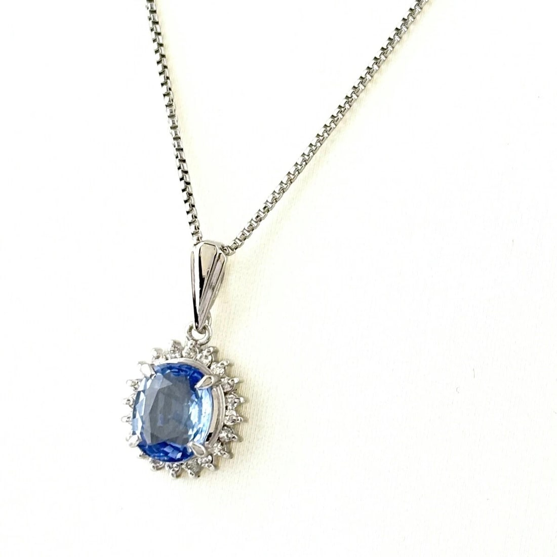 SAPPHIRE DESIGN PLATINUM PENDANT NECKLACE: Sapphire design Platinum Pendant Necklace Brand: Unbranded Type/Style: Necklace Material: Pt900, Main Stone sapphire Color: PT Size: Chain / code 45cm(17.7") Total length of the pendant head