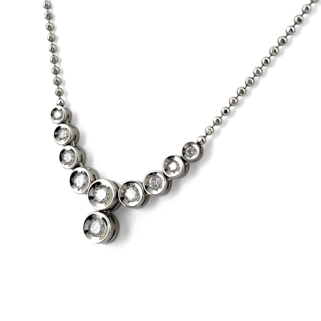 MELEE DIAMOND DESIGN NECKLACE PLATINUM PENDANT: melee diamond design necklace Platinum Pendant Brand: Unbranded Type/Style: Necklace Material: Pt850, Color: PT Size: Chain / code 41cm(16.1") Pendant size 10.9?37.5mm(0.4") Accessories: None