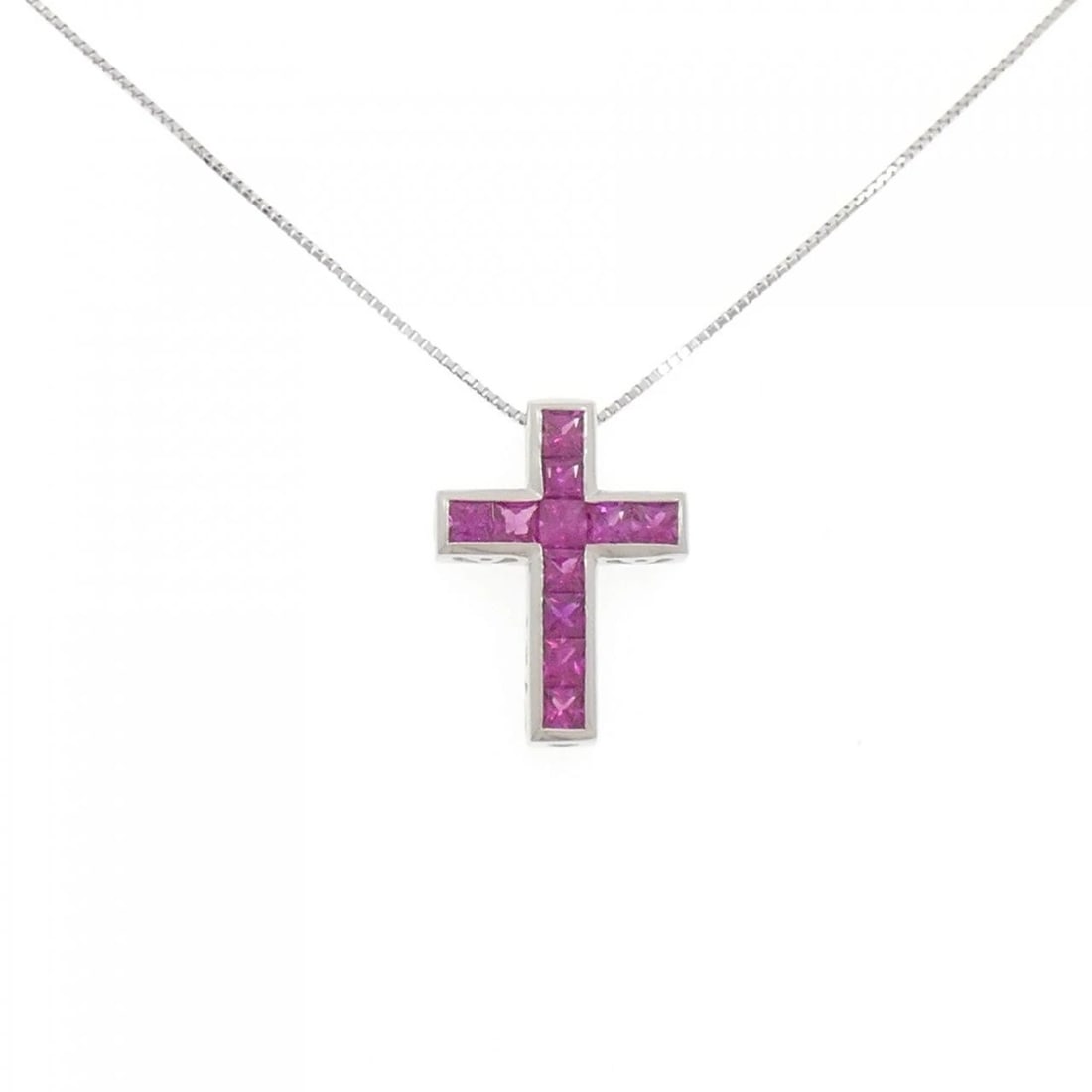 PT900/PT850 CROSS RUBY NECKLACE: PT900/PT850 Cross Ruby Necklace Brand: Unbranded Type/Style: Ruby Necklace Material: PT900/PT850, Main Stone Ruby Color: Silver Size: Actual Size Pendant length approx. x width approx.: 20.2mmx14.7mm 