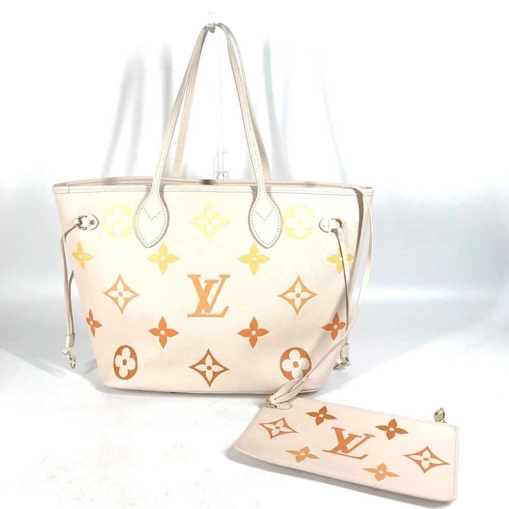 LOUIS VUITTON MONOGRAMEMPREINTE SHOULDER BAG: LOUIS VUITTON MonogramEmpreinte Shoulder Bag Brand: LOUIS VUITTON Type/Style: Tote Bag Material: MonogramEmpreinteLeather Color: Beige Size: W12.6?H11.0?D6.1inch / W32cm?H28cm?D15.5cm Accessories: