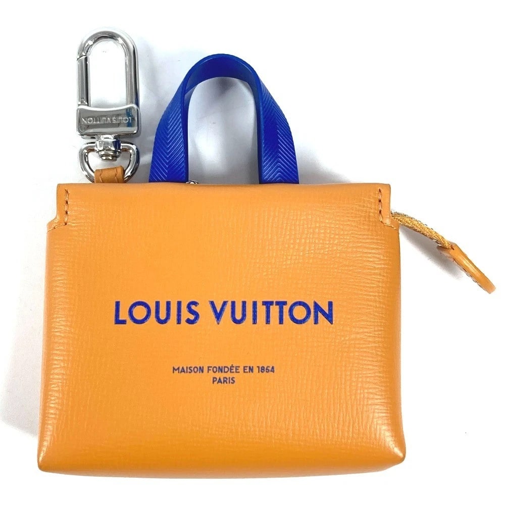 LOUIS VUITTON LV LOGO CHARM-LV MINI: LOUIS VUITTON LV logo Charm-LV Mini Brand: LOUIS VUITTON Type/Style: Key Holder Material: Leather Color: orange x Blue Size: W3.7?H4.3inch / W9.5cm?H11cm Accessories: None Accessories Noti