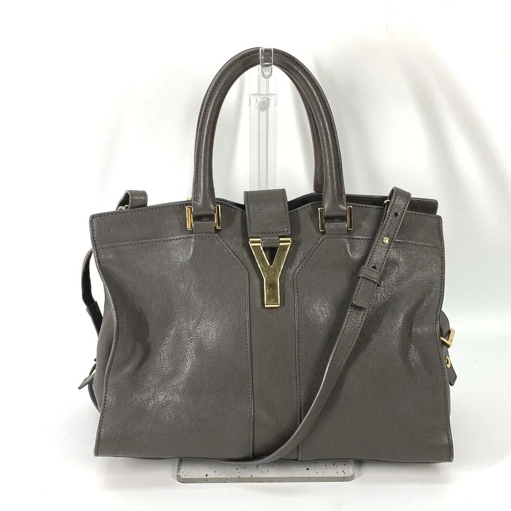 YVES SAINT LAURENT CAVAS CHIC TOTE BAG 2WAY BAG: YVES SAINT LAURENT Cavas chic Tote Bag 2WAY Bag Brand: YVES SAINT LAURENT Type/Style: Hand Bag Material: Leather Color: grayxgold Size: W11.6?H8.1?D5.5inch / W29.5cm?H20.5cm?D14cm Accessories: Non