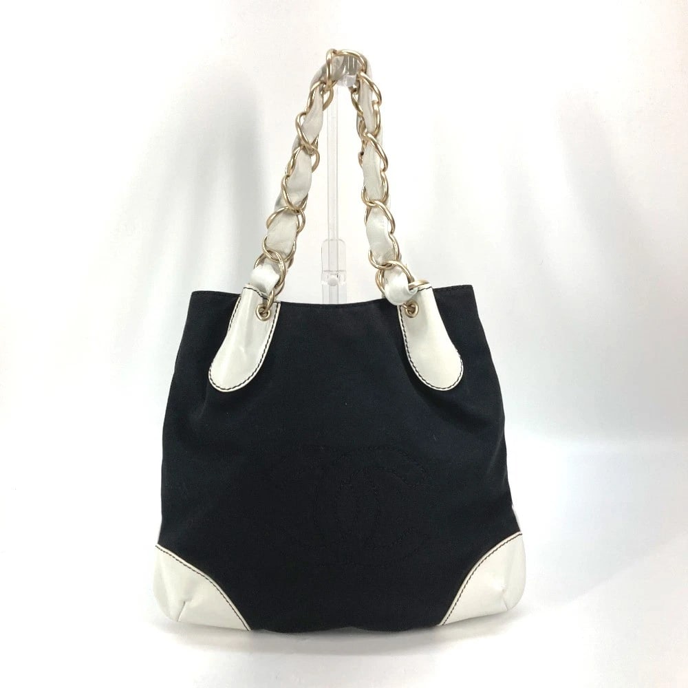 CHANEL BICOLOR BIG COCO CHAIN BAG SHOULDER BAG: CHANEL Bicolor Big Coco Chain Bag Shoulder Bag Brand: CHANEL Type/Style: Shoulder Bag Material: Canvas / Leather Color: Black / White Size: W9.8?H11.8inch / W25cm?H30cm Accessories: None Accessories