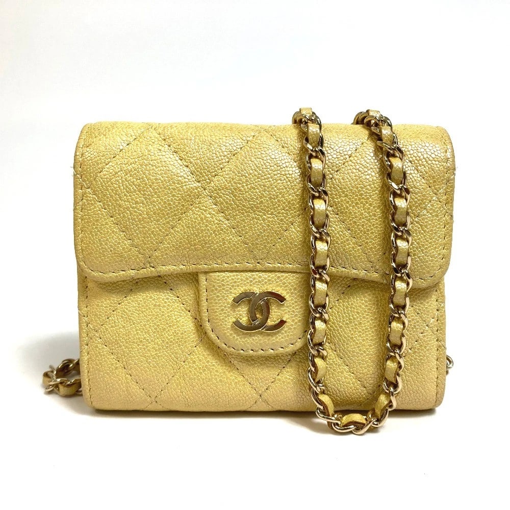 CHANEL CC MATELASSE CHAIN WALLET COIN PURSE: CHANEL CC Matelasse Chain wallet coin purse Brand: CHANEL Type/Style: coin purse Material: Caviar Leather Color: Metallic yellow/GoldHardware Size: W4.3?H3.3?D0.8inch / W11cm?H8.5cm?D2cm Accessories: