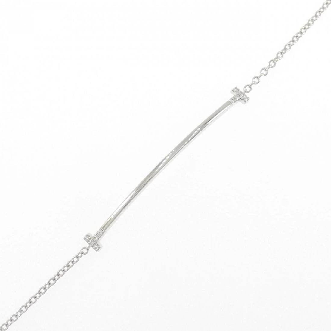 TIFFANY & CO. T SMILE BRACELET: TIFFANY & Co. T Smile Bracelet Brand: TIFFANY&Co. Type/Style: TIFFANY & Co. Bracelet Material: 750 white gold, Main Stone Natural Color: white gold Size: Lenght 15cm Actual Size Max width approx: