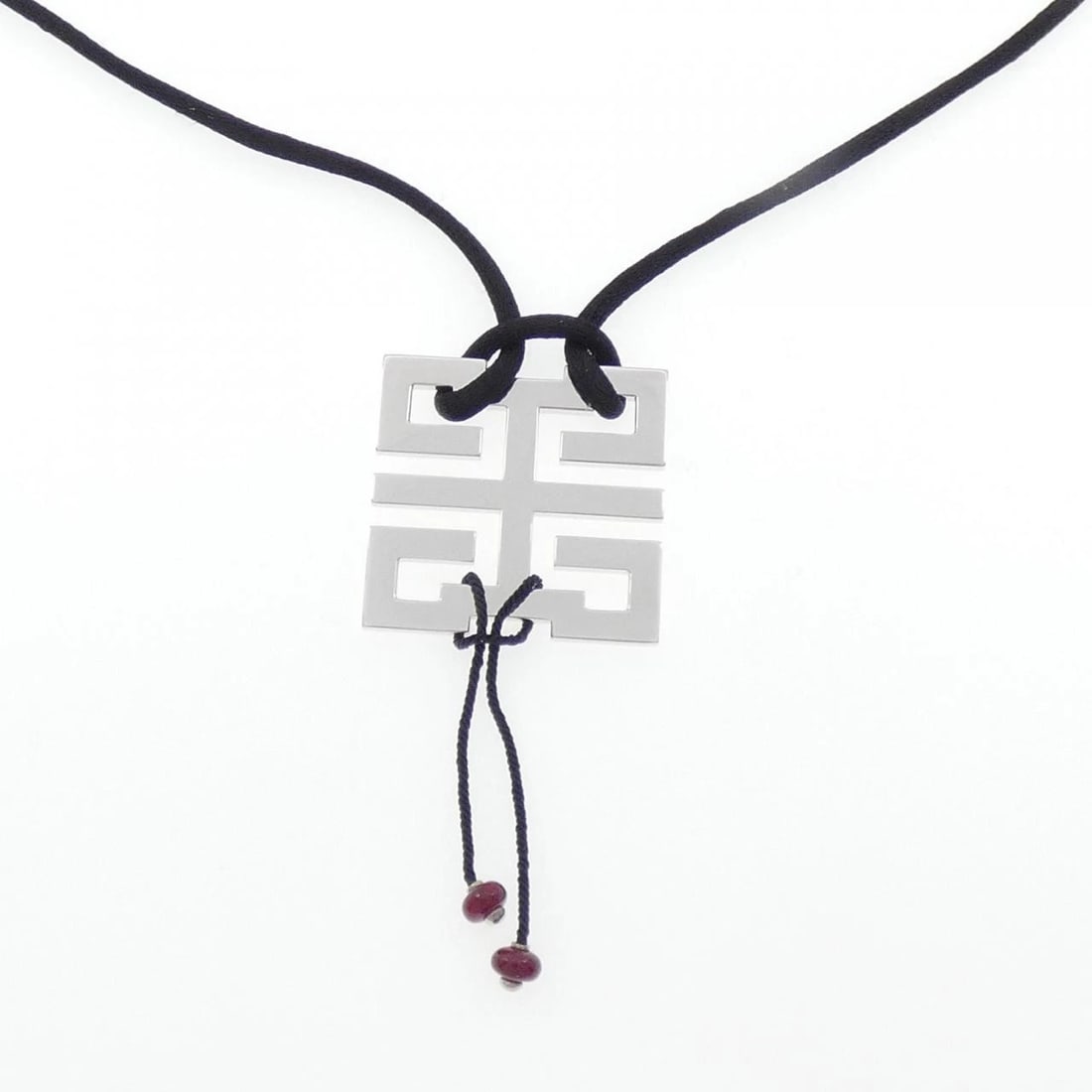 CARTIER WISHKNOT NECKLACE: Cartier Wishknot Necklace Brand: CARTIER Type/Style: Cartier Necklace Material: 750 white gold, Main Stone Ruby Color: White Gold Size: Length -53cm Actual Size Pendant Length approx. x width approx.: