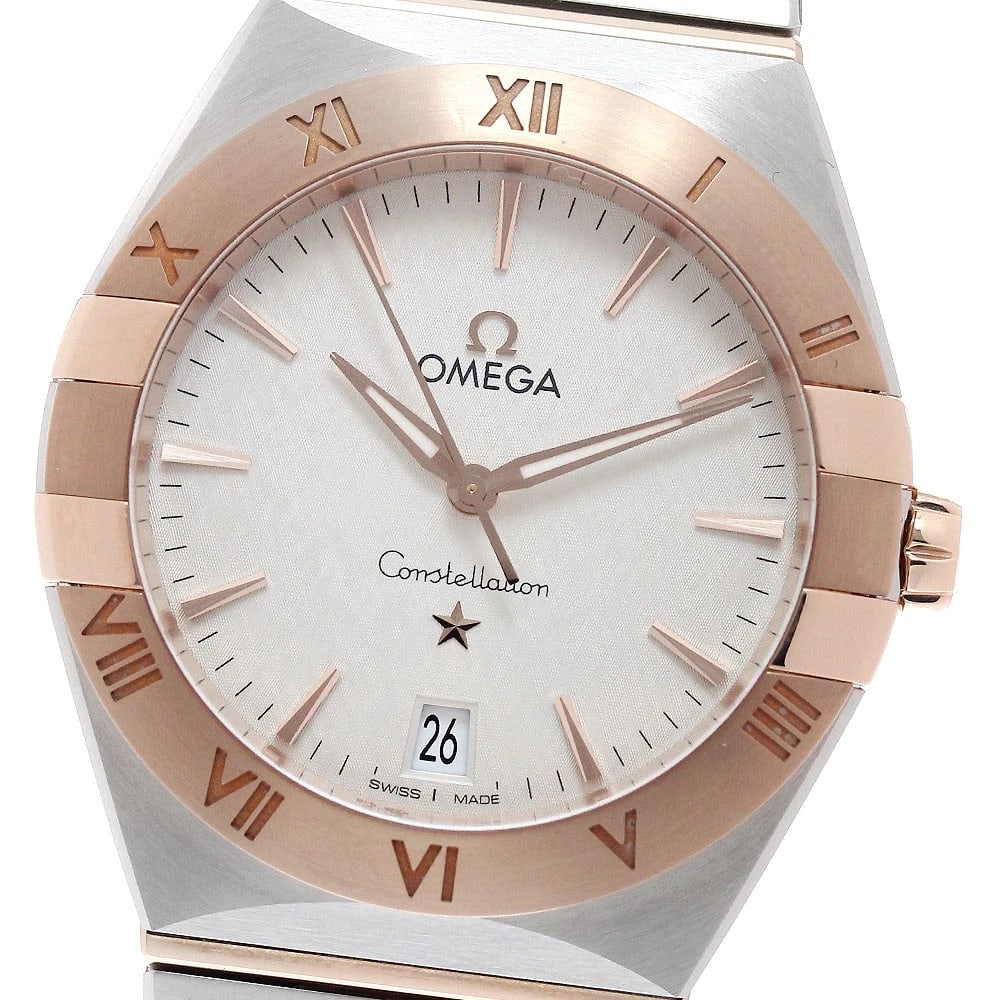 OMEGA CONSTELLATION K18PG QUARTZ WATCH: OMEGA Constellation K18PG Quartz Watch Brand: OMEGA Type/Style: Wristwatch Material: Band Material Stainless Steel/K18PG, Case Material Stainless Steel/K18PG Color: Case Color Silver / Gold Band