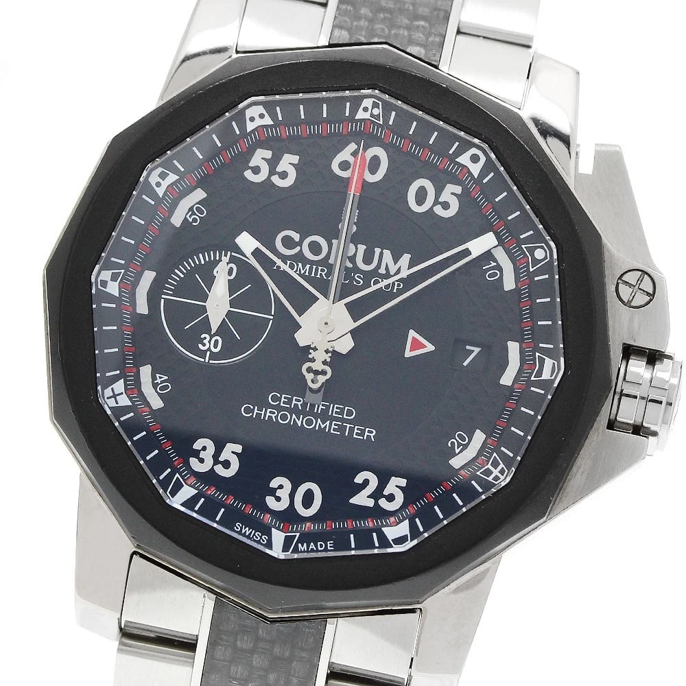 CORUM ADMIRAL CHRONO AUTOMATIC WATCH: CORUM Admiral Chrono Automatic Watch Brand: CORUM Type/Style: Wristwatch Material: Band Material Stainless Steel / Carbon, Case Material titanium Color: Case Color Silver / Black Band Color Silver / B