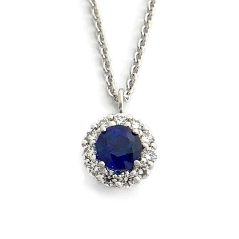 ROUND BLUE SAPPHIRE DIAMOND HALO PENDANT NECKLACE: Round Blue Sapphire Diamond Halo Pendant Necklace Brand: none Type/Style: Necklace Material: 14K White Gold, Main Stone Natural Color: Blue Size: Length: 18 inches Pendant: 8.4 mm Accessories: Non