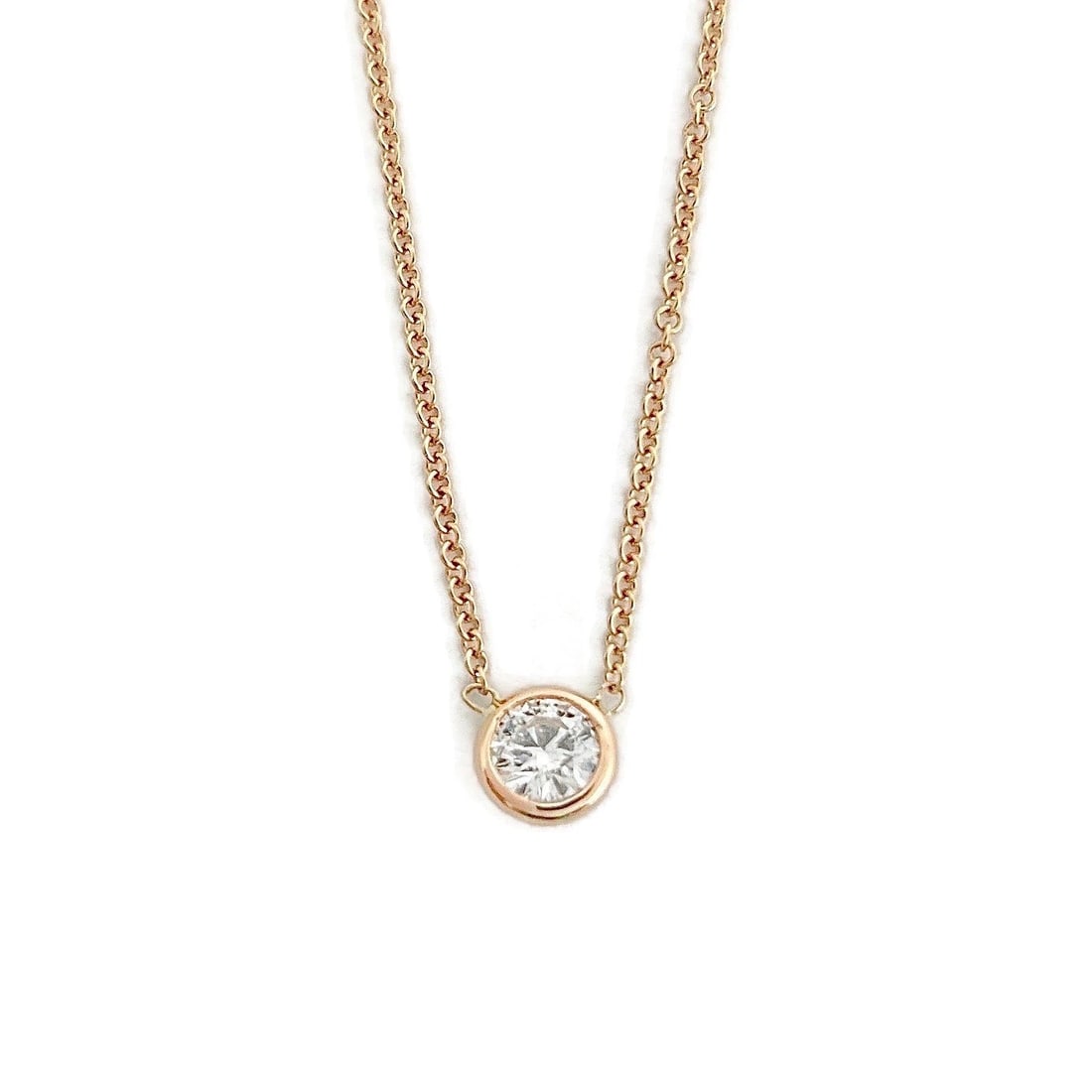 ROUND SOLITAIRE DIAMOND BEZEL PENDANT NECKLACE: Round Solitaire Diamond Bezel Pendant Necklace Brand: Unbranded Type/Style: Necklace Material: 14K Pink Rose Gold, Main Stone Natural Color: Gold Size: Length: 16 inches Pendant: 5.2 mm Accessories: