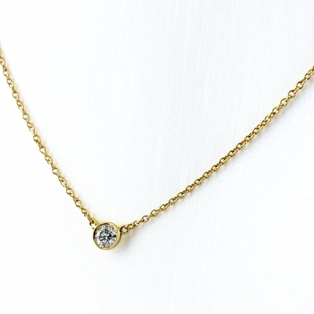 TIFFANY&CO. BY THE YARD NECKLACE: TIFFANY&Co. By the yard Necklace Brand: TIFFANY&Co. Type/Style: Necklace Material: 18K YG Color: YG Size: Chain / code 40cm(15.7") Pendant size 4.1×4.1mm(0.2") Accessories: None Accessories Notice: