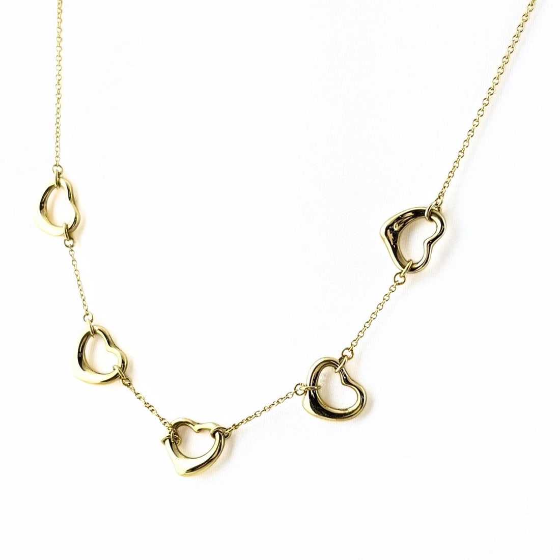 TIFFANY&CO. OPEN HEART 5-PIECE NECKLACE: TIFFANY&Co. Open Heart 5-Piece Necklace Brand: TIFFANY&Co. Type/Style: Necklace Material: 18K YG Color: YG Size: Chain / code 42cm(16.5") Pendant size 111.4×9.0mm(4.4") Accessories: None Accessories