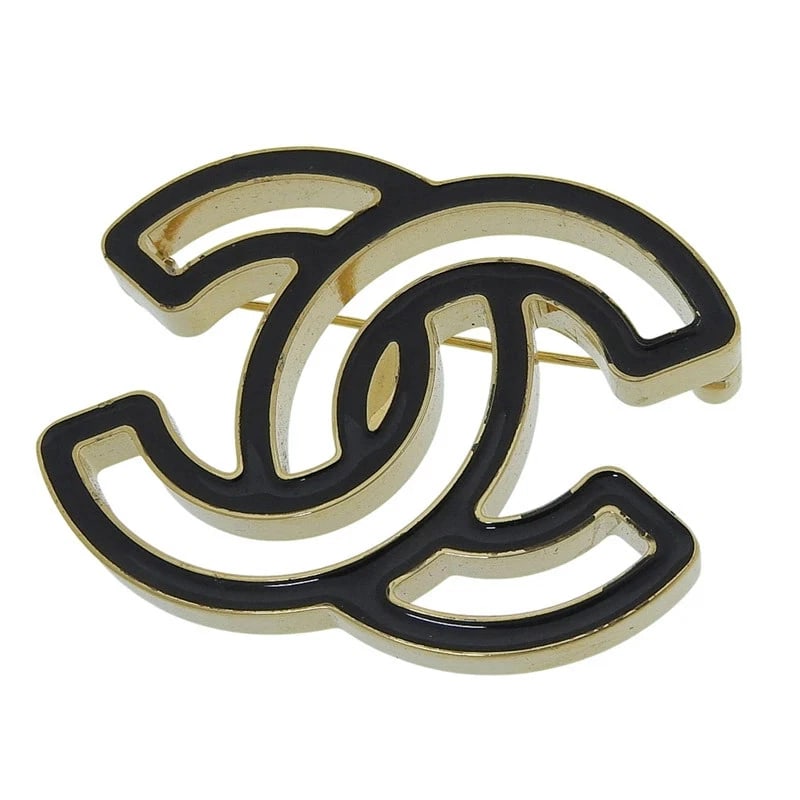 CHANEL COCOMARK BROOCH BLACK/GOLD: CHANEL Cocomark Brooch Black/Gold Brand: CHANEL Type/Style: Brooch Material: Metal (assumed from description) Color: Black, Gold Size: none Accessories: None Accessories Notice: When purch