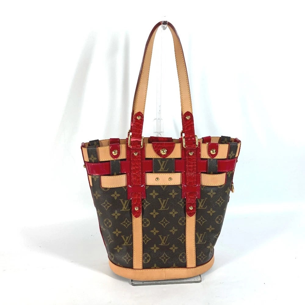 LOUIS VUITTON MONOGRAM RUBY NEO BUCKET SHOULDER BAG: LOUIS VUITTON Monogram Ruby Neo bucket Shoulder Bag Brand: LOUIS VUITTON Type/Style: Tote Bag Material: MonogramCanvas / Patent Leather Color: Brown / Red Size: W9.3?H11.0?D5.9inch / W23.5cm?H28cm?D15