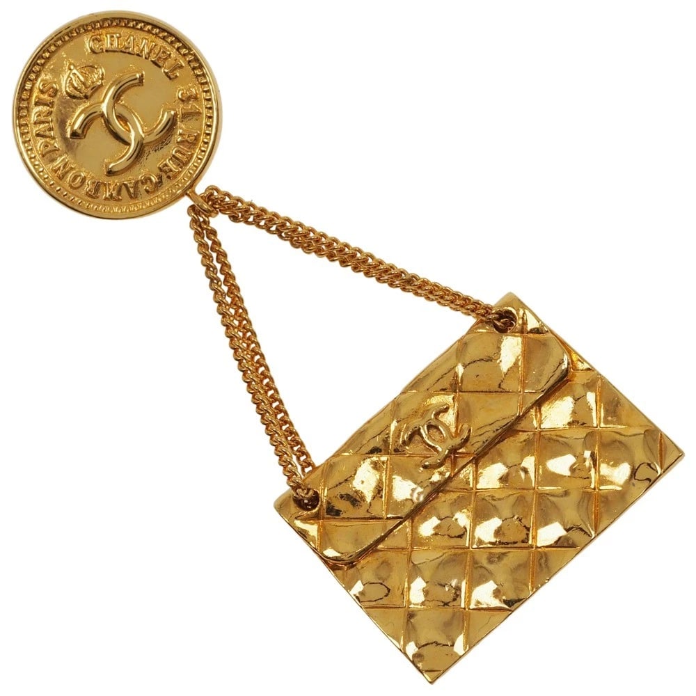 CHANEL COCO MARK BROOCH MATELASSE BAG MOTIF PLATED GOLD: CHANEL COCO Mark Brooch Matelasse bag motif Plated Gold Brand: CHANEL Type/Style: Brooch Material: Plated Gold Color: Gold Size: Size(CM) 80mm x 35mm Accessories: None Accessories Notice: