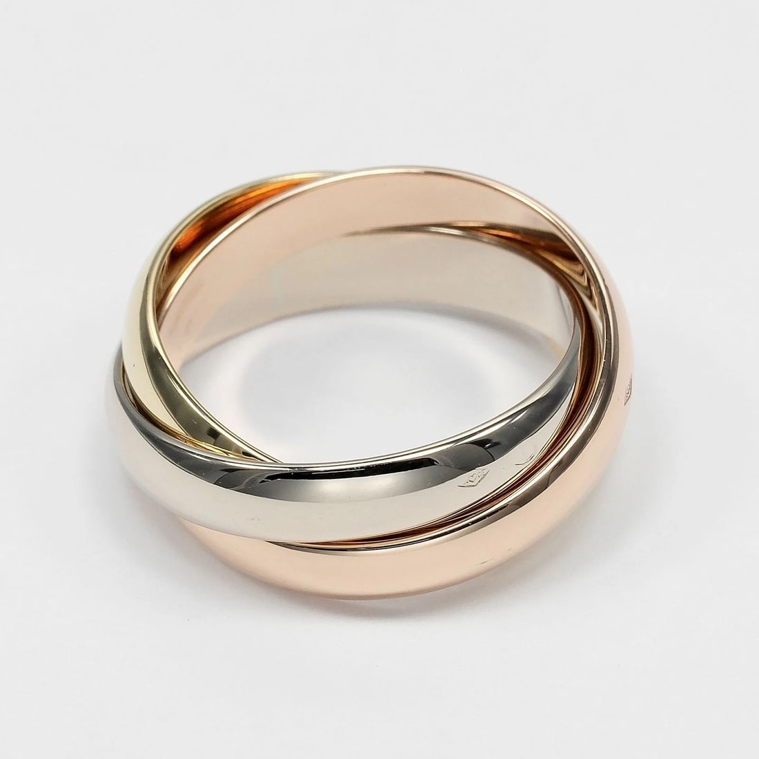 CARTIER TRINITY RING 0.1" BAND K18 GOLD (YGXPGXWG): CARTIER Trinity Ring 0.1" band K18 Gold (YGxPGxWG) Brand: CARTIER Type/Style: Ring Material: K18 Gold (YGxPGxWG) Color: Gold Size: 4.3(US Size) Accessories: None Accessories Notice: When p