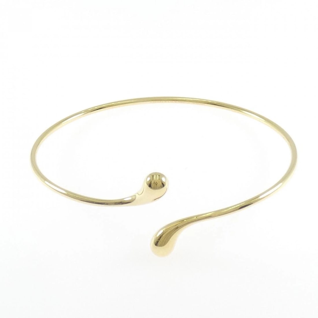 TIFFANY & CO. TEARDROP BANGLE: TIFFANY & Co. Teardrop Bangle Brand: TIFFANY&Co. Type/Style: TIFFANY & Co. Bracelet Material: 750 yellow gold Color: Yellow Gold Size: length19cmActual Size Max width approx: 23.2mm Accessories: None