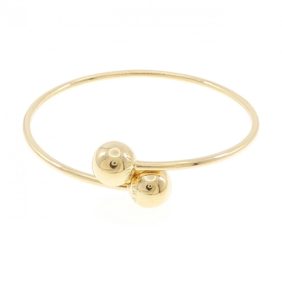 TIFFANY&CO. BALL BYPASS BANGLE: TIFFANY&Co. Ball Bypass Bangle Brand: TIFFANY&Co. Type/Style: TIFFANY & Co. Bracelet Material: 750 yellow gold Color: Yellow Gold Size: Length16.5cm Actual Size Max width approx: 16.5mm Accessories: