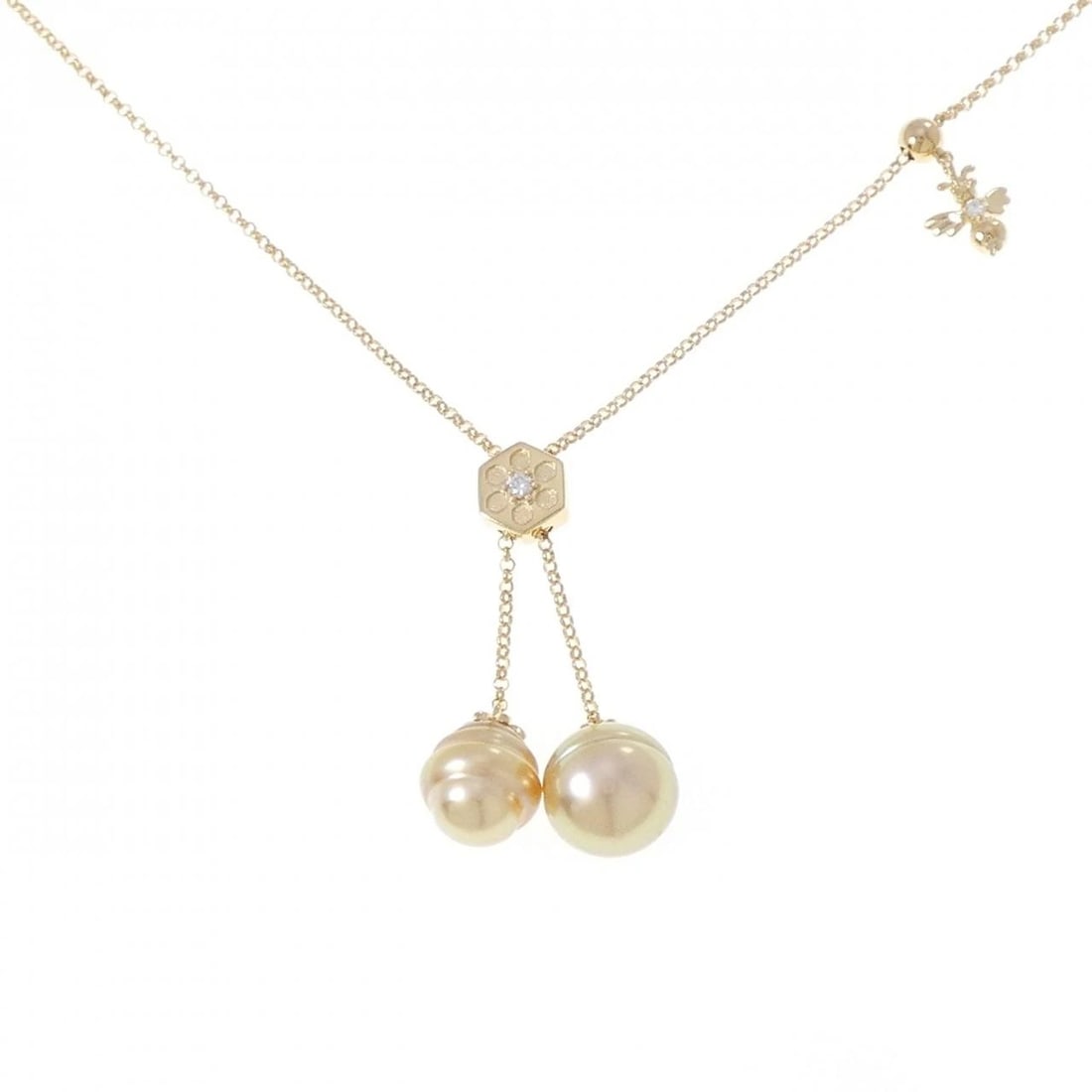 TASAKI WHITE BUTTERFLY PEARL NECKLACE: Tasaki White Butterfly Pearl Necklace Brand: TASAKI Type/Style: Tasaki Necklace Material: K18 yellow gold Main Stone White Butterfly Pearl Color: Yellow Gold Size: Length -53cm Actual Size Pendant