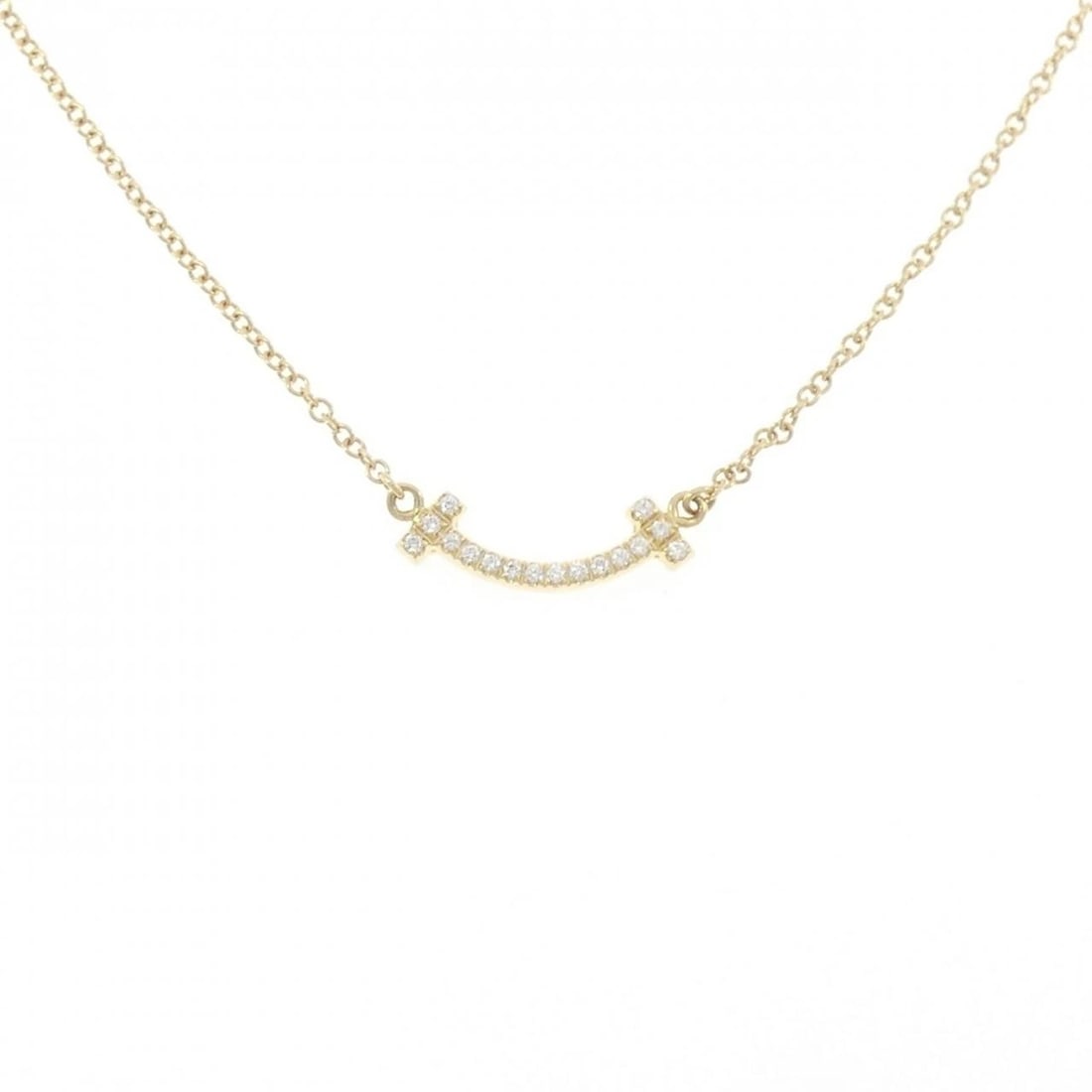 TIFFANY & CO. T SMILE MINI NECKLACE: TIFFANY & Co. T Smile Mini Necklace Brand: TIFFANY&Co. Type/Style: TIFFANY&Co. Necklace Material: 750 yellow gold Main Stone Natural Color: Yellow gold Size: length41?46cmActual Size Pendant length