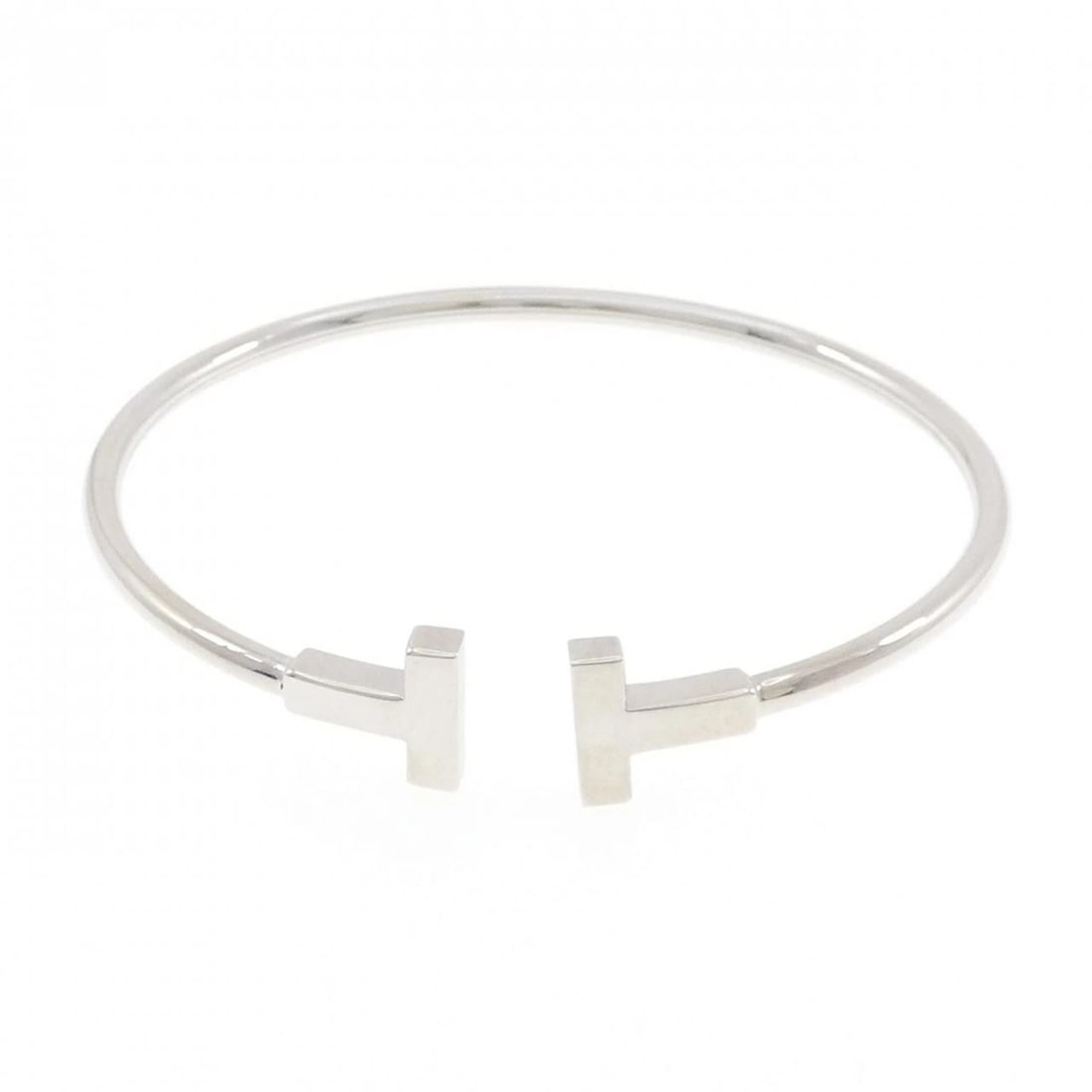 TIFFANY & CO. T-WIRE BANGLE: TIFFANY & Co. T-Wire Bangle Brand: TIFFANY&Co. Type/Style: TIFFANY & Co. Bracelet Material: 750 white gold Color: white gold Size: Length15cm Actual Size Max width approx: 9.5mm Diameteraround: 2.4mm