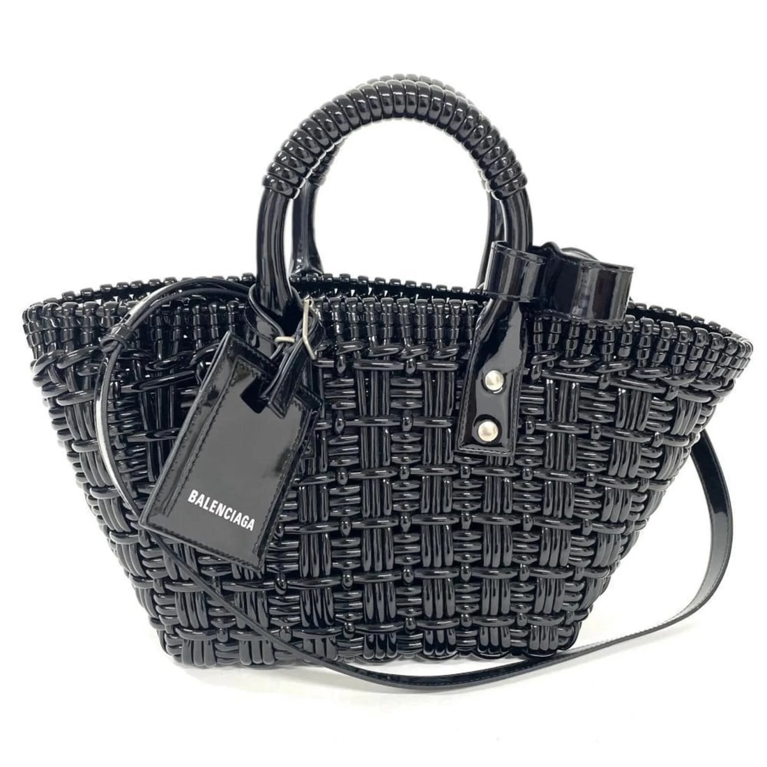 BALENCIAGA BISTRO XS BASKET HANDBAG, ENAMEL: Balenciaga Bistro XS Basket Handbag, Enamel Brand: Balenciaga Type/Style: Basket, Handbag Material: Leather Color: Black Size: 21cm x 19cm x 10cm / 8.26'' x 7.48'' x 3.93'' Accessories: None