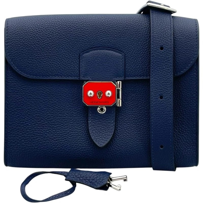 HERMES B BLUE SAPHIR TOGO SHOULDER BAG: HERMES B Blue Saphir Togo Shoulder Bag Brand: HERMES Type/Style: Shoulder Bag Material: Togo Color: Blue Saphir SV Hardware Size: W: 21cm / H: 17cm / D: 4cm Accessories: None Accessories Notice: When