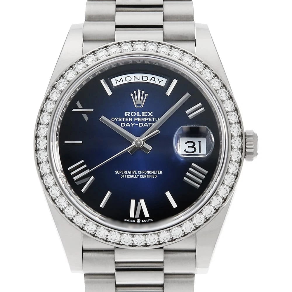 ROLEX DATE BEZEL DIAMOND BAGUETTE WATCH: ROLEX Date Bezel Diamond Baguette watch Brand: ROLEX Type/Style: Wrist watch Material: Band Material White Gold, Case Material White Gold Color: Dial Color Blue Size: Case:W40mm Circumference of Wrist