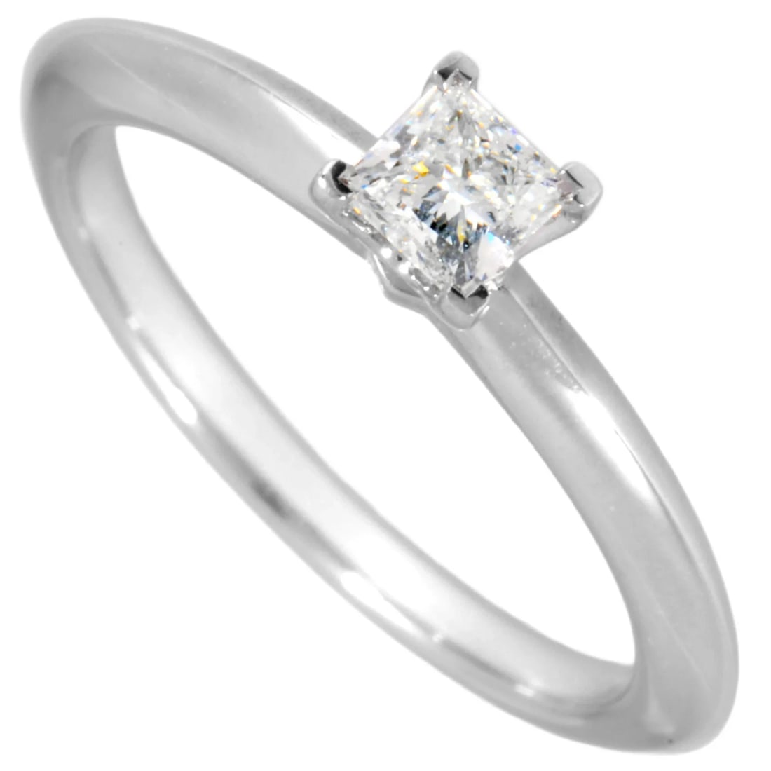 TIFFANY & CO. SOLITAIRE PRINCESS CUT RING: Tiffany & Co. Solitaire Princess Cut Ring Brand: Tiffany Type/Style: Band ring Material: Color: Platinum Size: 5 US Accessories: None Accessories Notice: When purchasing pre-owned goods, p