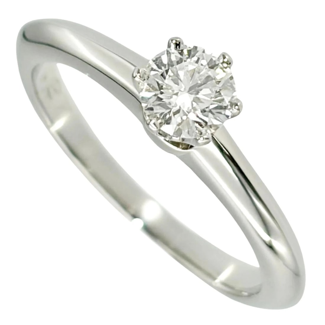 TIFFANY & CO. SOLITAIRE RING DIAMOND: Tiffany & Co. Solitaire Ring, Diamond Brand: Tiffany Type/Style: Band ring Material: Color: Platinum Size: 3.5 US Accessories: None Accessories Notice: When purchasing pre-owned goods, please refer