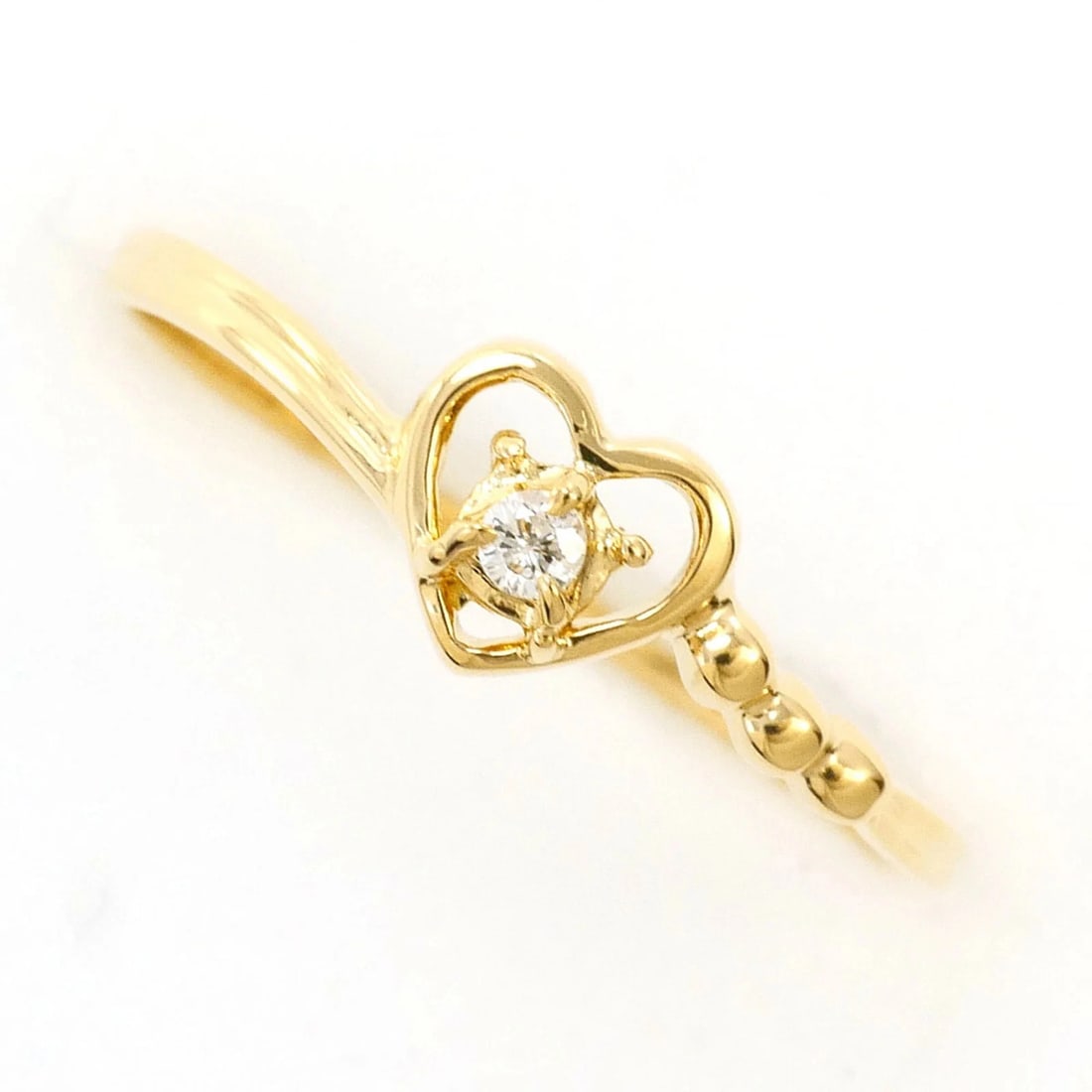 18K YELLOW GOLD RING DIAMOND: 18K yellow gold ring diamond Brand: Unbranded Type/Style: Band ring Material: Color: Yellow gold Size: 5.5 US Accessories: None Accessories Notice: When purchasing pre-owned goods, please