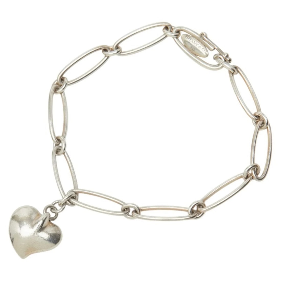 TIFFANY & CO. CURVED HEART BRACELET: Tiffany & Co. Curved Heart Bracelet Brand: Tiffany Type/Style: Charm bracelet Material: Color: Silver Size: Length 15.5cm / 6.1'' Accessories: None Accessories Notice: When purchasing pre-