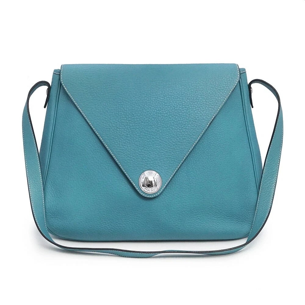 HERMES CHRISTINE CROSSBODY SHOULDER BAG: Hermes Christine Crossbody Shoulder Bag Brand: Hermes Type/Style: Bag Material: Exterior Material Fjord Leather Color: Exterior Color Bleu Jean Size: Height: 11.0 inches (28 cm) Width: 13.8 inches (35
