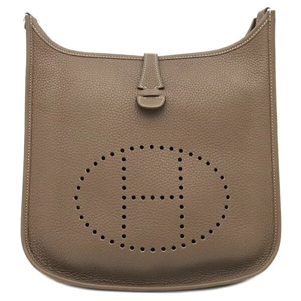 HERMES EVELYNE 3 PM SHOULDER BAG: Hermes Evelyne 3 PM Shoulder Bag Brand: Hermes Type/Style: Bag Material: Exterior Material Taurillon Clemence Leather Color: Exterior Color Etoupe Size: Height: 11.8 inches (30 cm) Width: 11.0 inches 