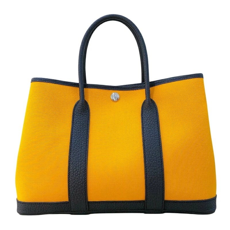 HERMES HANDBAG GARDEN PARTY TPM TOTE BAG: Hermes Handbag Garden Party TPM Tote Bag Brand: Hermes Type/Style: Bag Material: Exterior Material Toile / Negonda leather Color: Exterior Color Mustard / Blue Indigo Size: Height: 8.3 inches (21 cm) 