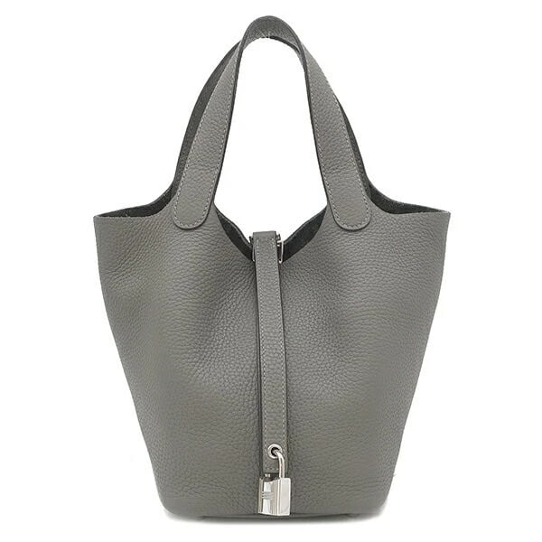 HERMES PICOTIN LOCK 18 PM TOTE BUCKET BAG: Hermes Picotin Lock 18 PM Tote Bucket Bag Brand: Hermes Type/Style: Bag Material: Exterior Material Taurillon Clemence Leather Color: Exterior Color Gris Meyer Size: Height: 7.5 inches (19 cm) Width: 