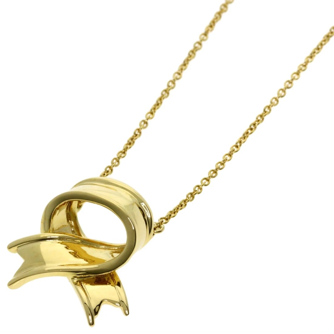 TIFFANY&CO. RIBBON NECKLACE K18 YELLOW GOLD: TIFFANY&Co. ribbon Necklace K18 Yellow Gold Brand: TIFFANY&Co. Type/Style: Necklace Material: K18 Yellow Gold Color: Gold Size: Chain Length:18.1inch/46cm Chain Width:0.4inch/1mm Top Size:0.6inch/16.2