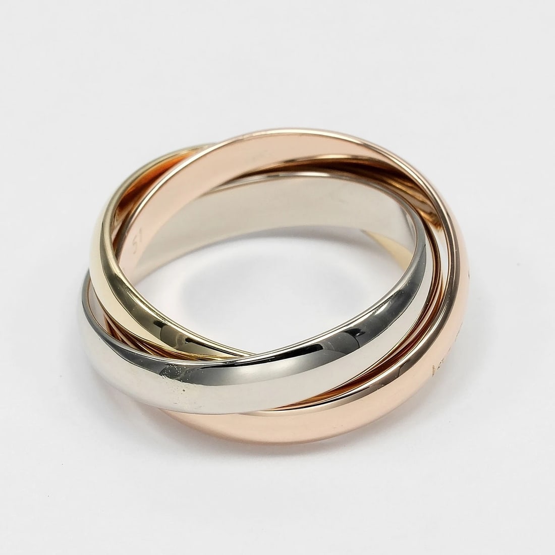 CARTIER TRINITY RING 0.1" BAND K18 GOLD (YGXPGXWG): CARTIER Trinity Ring 0.1" band K18 Gold (YGxPGxWG) Brand: CARTIER Type/Style: Ring Material: K18 Gold (YGxPGxWG) Color: Gold Size: 4.3(US Size) Accessories: None Accessories Notice: When purchasing