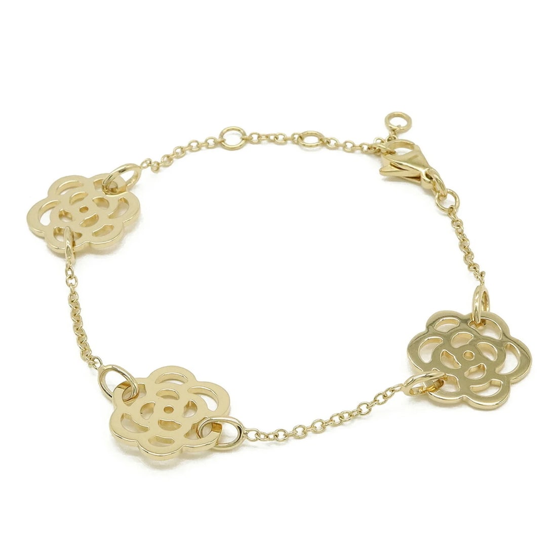 CHANEL CAMELLIA 3-MOTIF CHAIN BRACELET: CHANEL Camellia 3-Motif Chain Bracelet Brand: Chanel Type/Style: Charm bracelet Material: Yellow gold (18K) Color: Yellow gold Size: Length 17.5cm / 6.88'' Accessories: None Accessories Notice: When