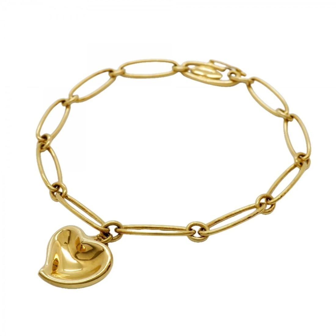 TIFFANY & CO. FULL HEART BRACELET 18K YELLOW GOLD: Tiffany & Co. Full Heart Bracelet, 18K Yellow Gold Brand: Tiffany Type/Style: Charm bracelet Material: Yellow gold (18K) Color: Yellow gold Size: Length 17cm / 6.69'' Accessories: None Accessories