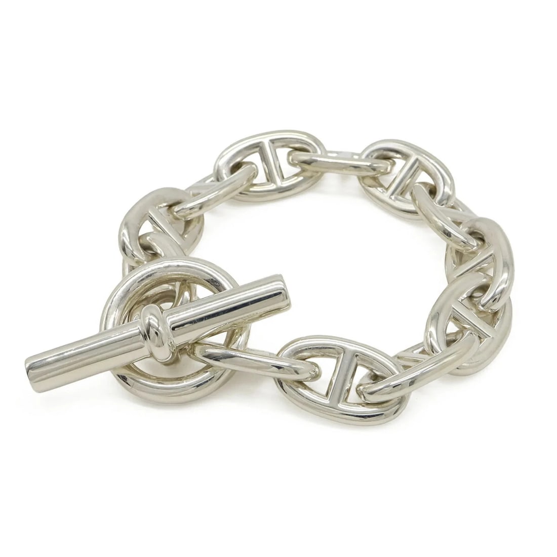 HERMES CHAINE D'ANCRE TGM 12-LINK BRACELET: HERMES Chaine d'Ancre TGM 12-link bracelet Brand: Hermes Type/Style: Charm bracelet Material: Silver 925 Color: Silver Size: Length 23cm / 9.05'' Accessories: None Accessories Notice: When purchasing