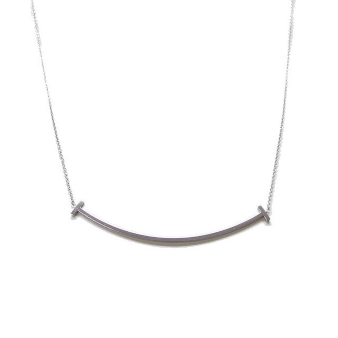 TIFFANY & CO. T SMILE PENDANT: Tiffany & Co. T Smile Pendant Brand: Tiffany Type/Style: Necklace Material: White gold (18K) Color: White gold Size: Neck Circumference 40.5 cm - 45 cm / 15.94'' - 17.71'' Pendant Size 15mm x 70mm /