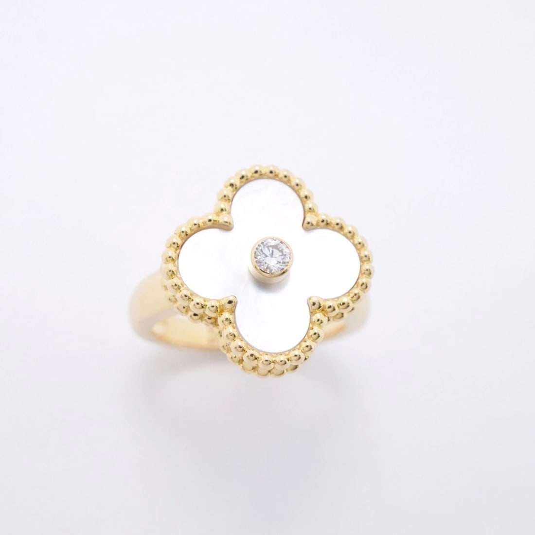 VAN CLEEF & ARPELS ALHAMBRA RING: Van Cleef & Arpels Alhambra Ring Brand: Van Cleef & Arpels Type/Style: Band ring Material: Mother of pearl Yellow gold (18K) Main Stone Natural Color: None Size: 4 US Accessories: None Accessories