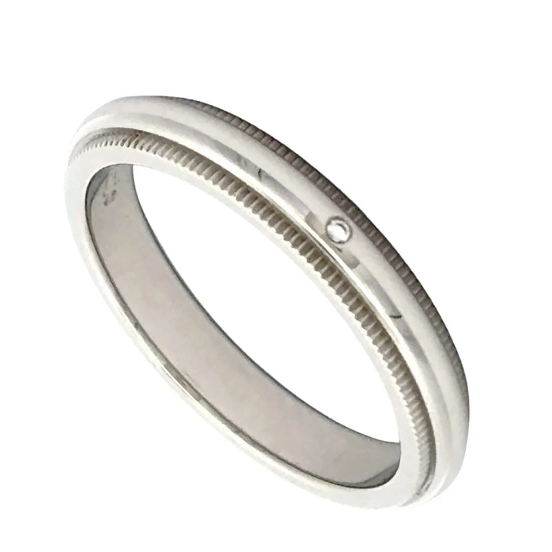 TIFFANY & CO. MILGRAIN RING: Tiffany & Co. Milgrain Ring Brand: Tiffany Type/Style: Band ring Material: Platinum 950 Color: None Size: 7.5 US Accessories: None Accessories Notice: When purchasing pre-owned goods, please refer to